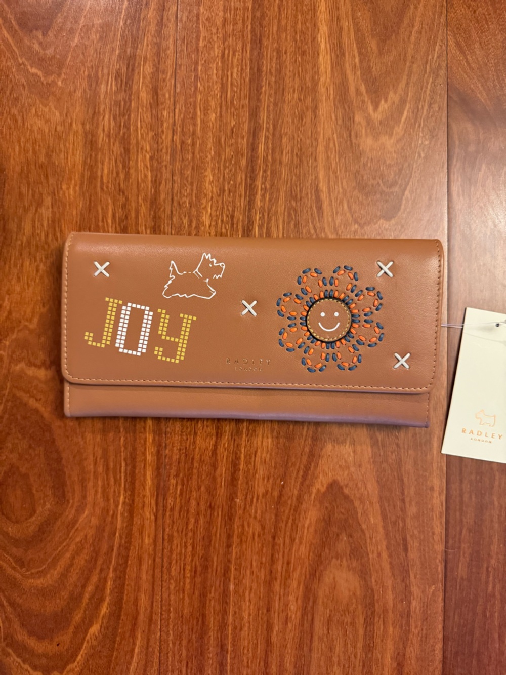 Radley London Joy patch Large Flapover Wallet